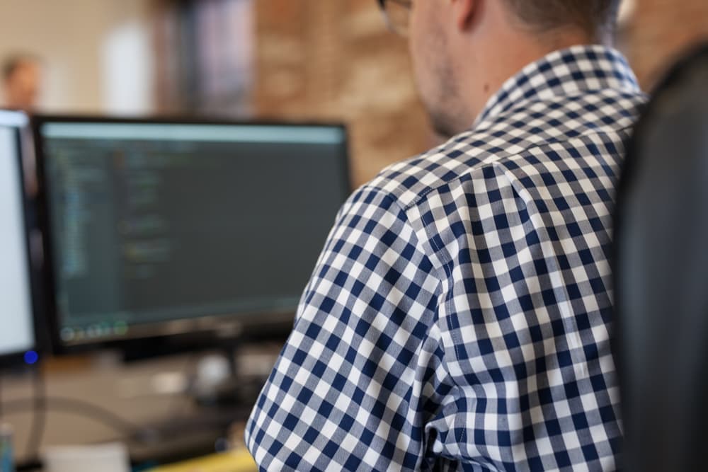 man working at computer